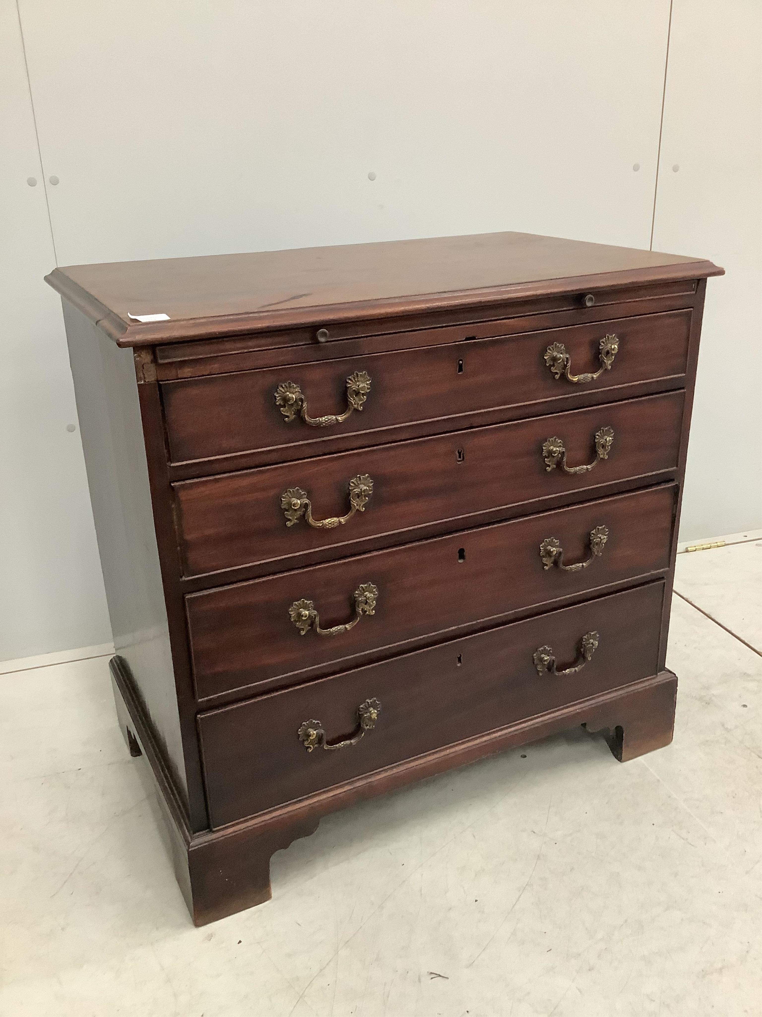 A George III mahogany chest with brushing slide, width 83cm, depth 51cm, height 81cm. Condition - fair